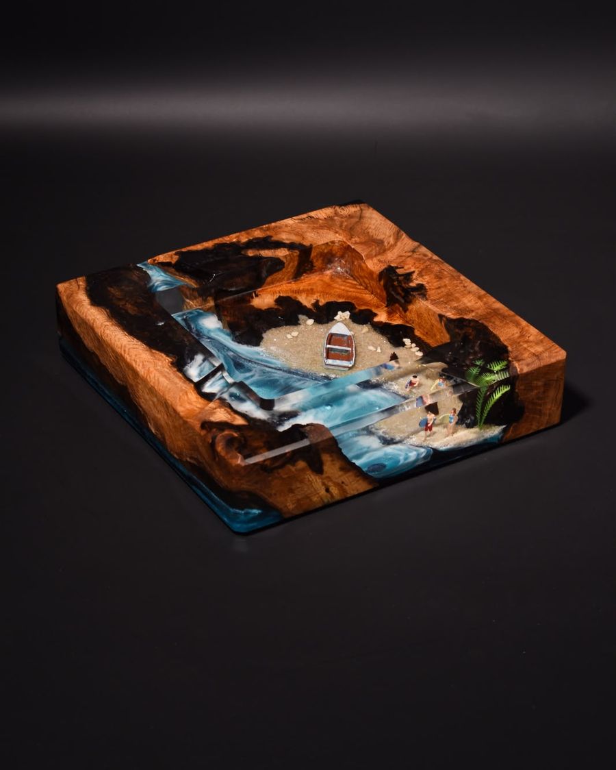 Beach Cove ashtray with a miniature beach, boat and blue resin waves